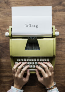 Write for Us typewriter typing out Blog onto a piece of paper.